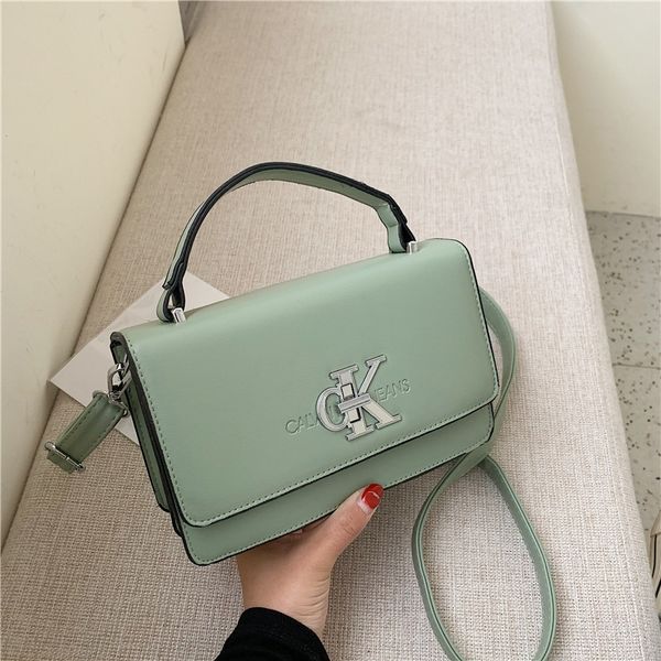 

women's 2020 new pu single shoulder diagonal foreign fashion solid color small square hand small square bag hand bag, White