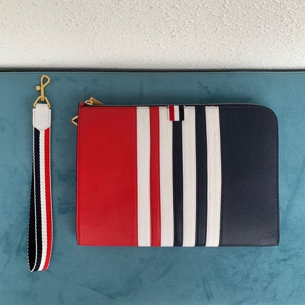 

7a high-end custom quality new matching color handbag adopts red matching blue color design fabric litchi grain cowhide super texture