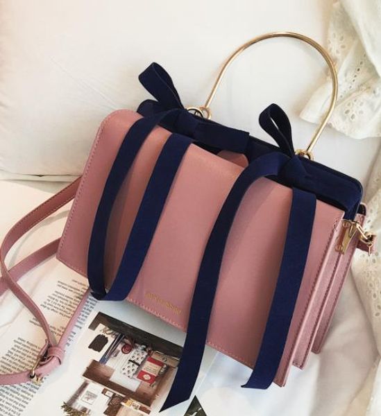 

2020 three-dimensional trapezoidal generous bag double bowknot one shoulder diagonal portable female bag
