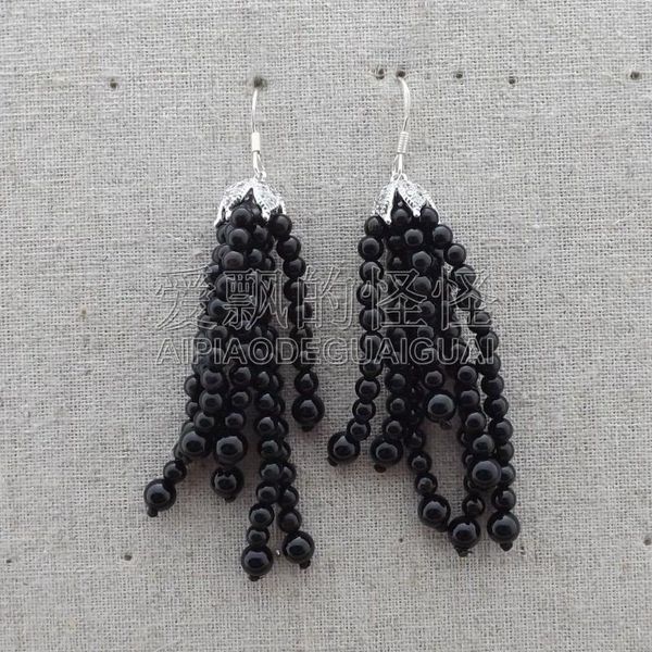 

women's onyx tassel earrings, Golden