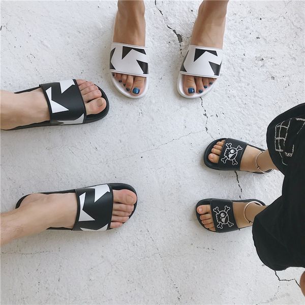 

nu classic skeleton black and white slippers stars parent-child beach slippers with the same cloth bag, Black;grey