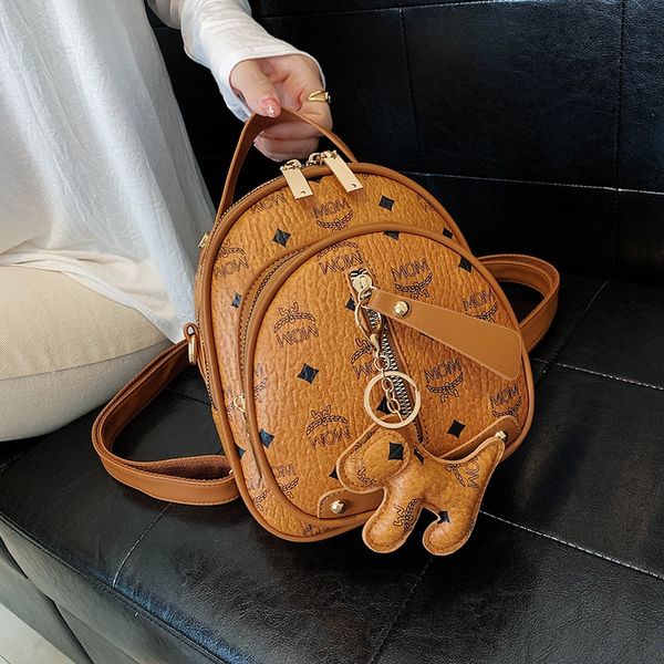 

women's 2020 new korean fashion student bag ins super small bag backpack fire printed rivet small backpack fashion