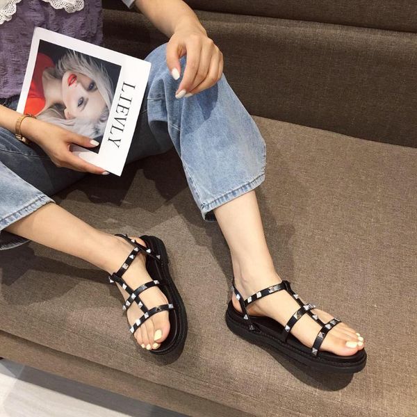 

2020 summer new fashion riveting nail women's shoes pierced black buckle casual flat women's sandals -l2036-1