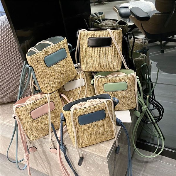 

2020 new seaside beach female belt fashionable hand-woven shoulder bucket bucket bag casual shoulder messenger bag female