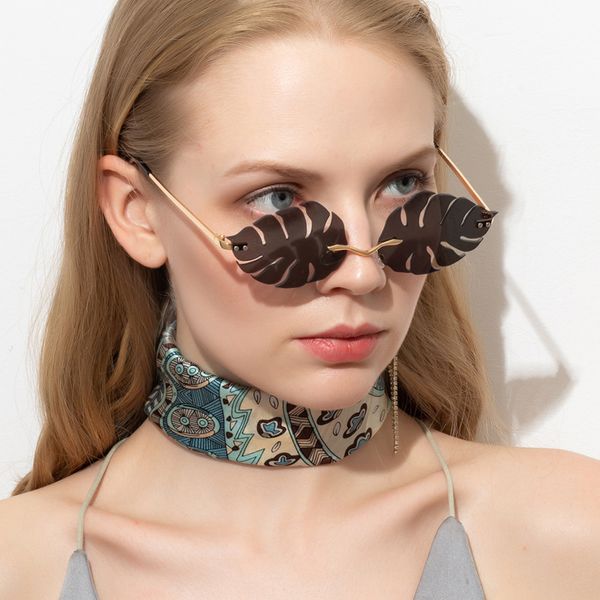 

fashion sunglasses ladies mirror retro frameless leaves sunglasses men frameless trend fashion retro small glasses, White;black