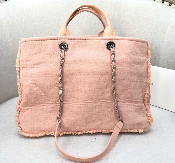 

new ladies beach bag 7a high-end custom quality hand-held shopping bag fashion style silver metal accessories with a long shoulder strap