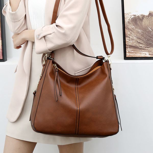 

new style women's bag european and american fashion handheld pu bag one shoulder crescent bag with oblique shoulder
