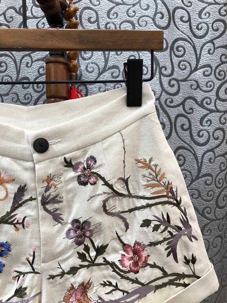 

2020 early spring new european fashion women's small fresh flowers tree embroidery linen mid waist casual curling shorts