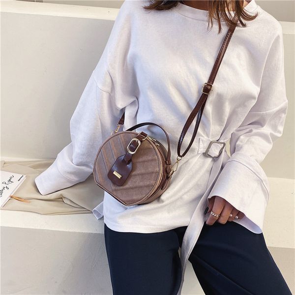 

europe and the united states fashion texture women's bag solid color shoulder bag messenger small round mobile phone