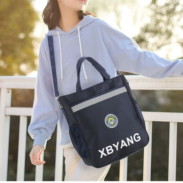 

pupil tutorial children's hand canvas slant single shoulder school men's and women's junior high schoolbag canvas bag school