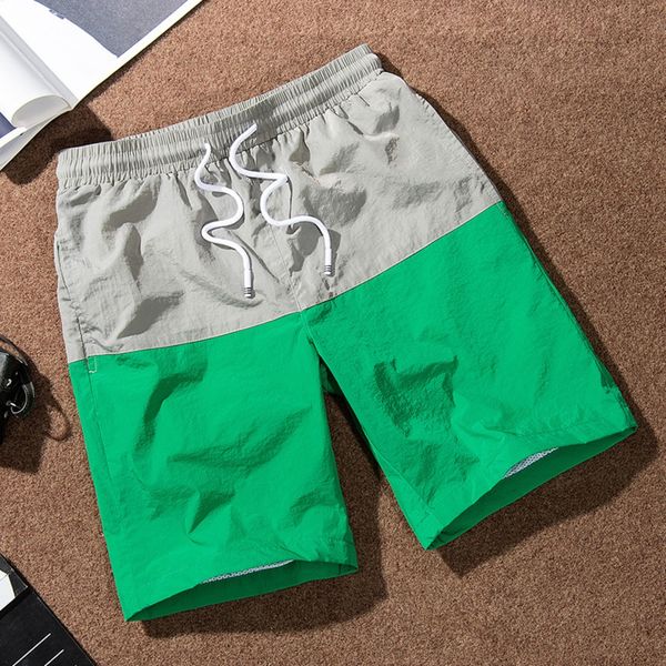 

men's athletic summer and and shorts light breathable quick-drying beach shorts male fifth pants color panel capri pants ju jia ku