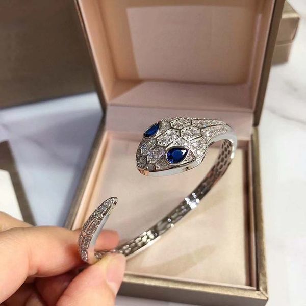 

fashionable sub-gold material with full diamond diamond grid all-match blue-eyed open snake bracelet female inner ring hollow grid design, Golden;silver