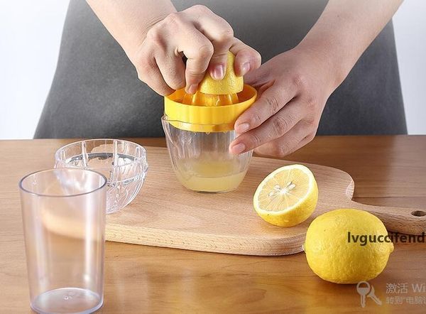 

express to your doorstepcreative household portable plastic juice cup manual juicer lemon hand squeezed juice mini juice