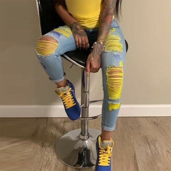 Jeans strappati alla moda per le donne Pantaloni in denim con graffio giallo Pantaloni a matita skinny a vita alta Scava fuori Jean Mujer femminile sexy