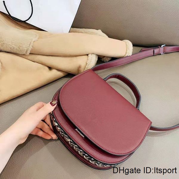 

new fashion joker semicircle on the saddle bag one shoulder his portable leather flip lock chain small lady handbag package