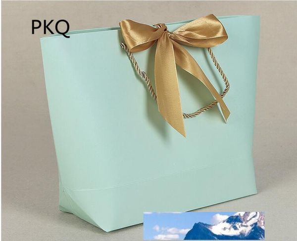 10 pçs / lote 21x7x17cm cor sólida kraft papel sacos de presente com alças 7colors roupas sapato shopping bolsa de empacotamento