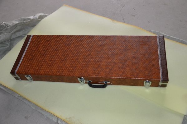 

brown square electric guitar hard case