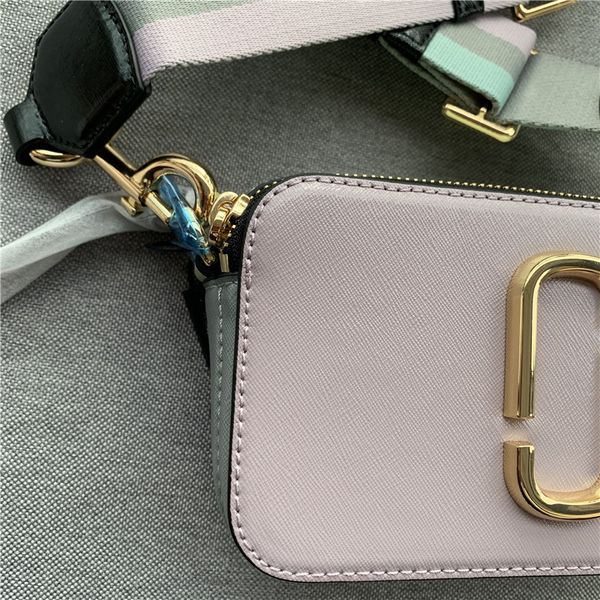 

2020 new camera head layer cowhide single bag crossbite bag star same model