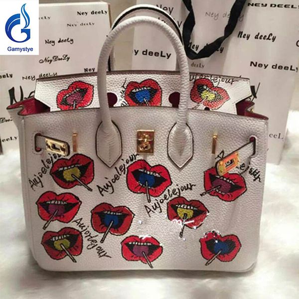 

handmake drawing graffiti street fashion pop lips and lollipop women genuine leather bags famous brand totes customized bag