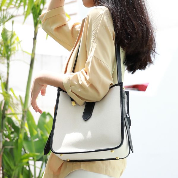 

atmospheric simple stitching canvas with first layer leather bag 2020 new large capacity portable tote bag shoulder