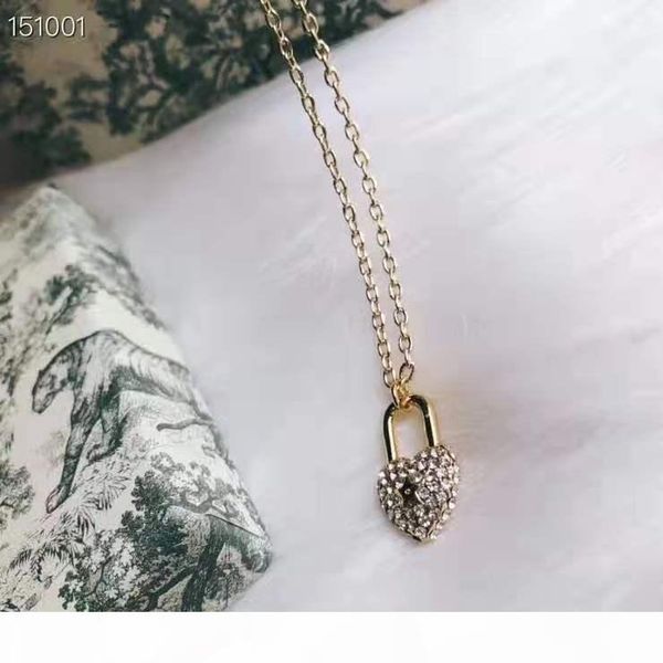 

the new autumn winter 2019 classic lock necklace is made of brass, gold plated and engraved, Golden;silver