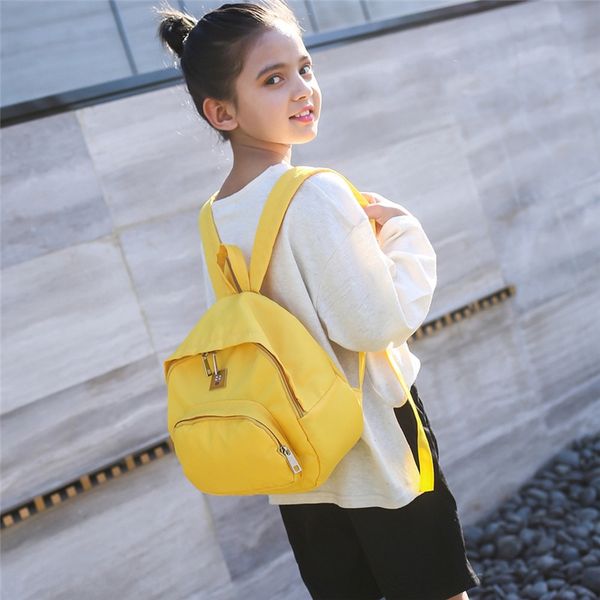 

одно- и двойного размер новых детского рюкзака нейлон сплошного цвета небольшого рюкзак отдых и путешествия корейского детский сад мешок