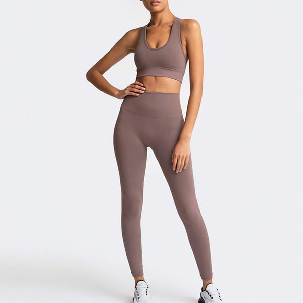 Set da yoga Reggiseno e leggings Abbigliamento da palestra da donna che modella Abiti da allenamento senza cuciture Abbigliamento sportivo Tuta sportiva da fitness