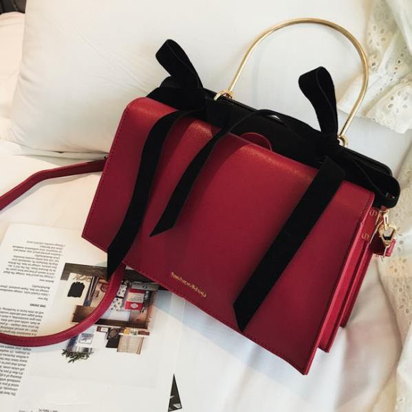 

new arrival 2020 three-dimensional trapezoidal generous bag double bowknot one shoulder diagonal portable female bag