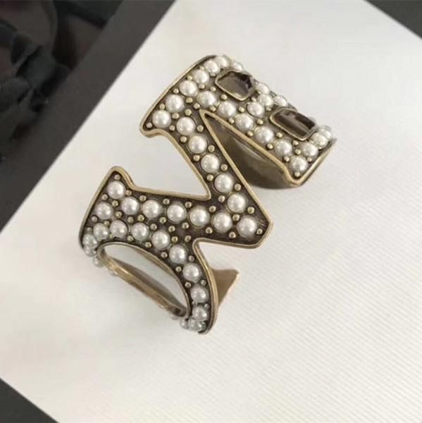 

новые ретро полых любовных письма полного жемчужных открытий дизайнер браслет роскошь дизайнер ювелирных изделия женщины браслеты, White