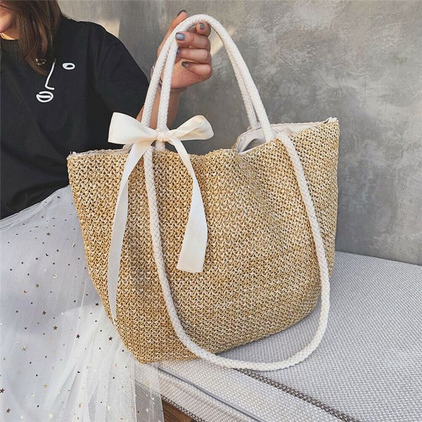 

womens fashionable shoulder bag new ribbon bowknot straw woven rattan bag ladies traveling soild color beach handbag sale