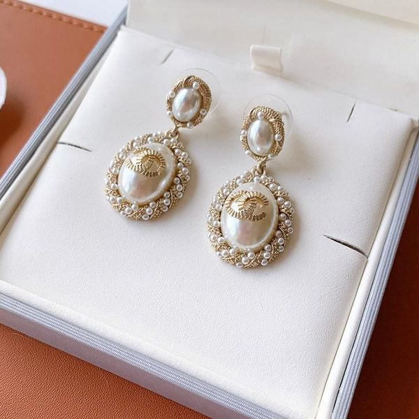 

c1935 fashionable high-grade twist eardrop s925 silver needle simple classic letter imitation pearl charm women earrings, Golden;silver
