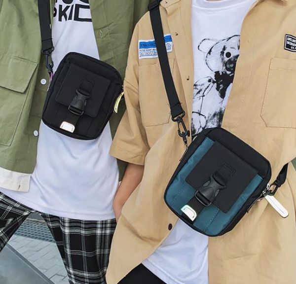 

2020 new street tide brand retro bag ins canvas tooling messenger cool shoulder bag men and women wild