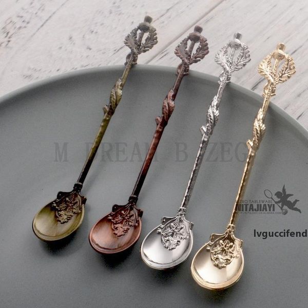 

thistle flower leaf spoon edwardian times vintage coffee spoon fruit dessert ice cream scoop ing