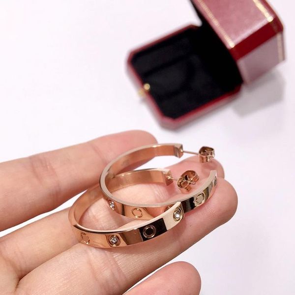 

stainless steel love jewelry men and women earrings fashion beautiful screw crystal smooth c-shaped titanium steel earrings, Golden;silver