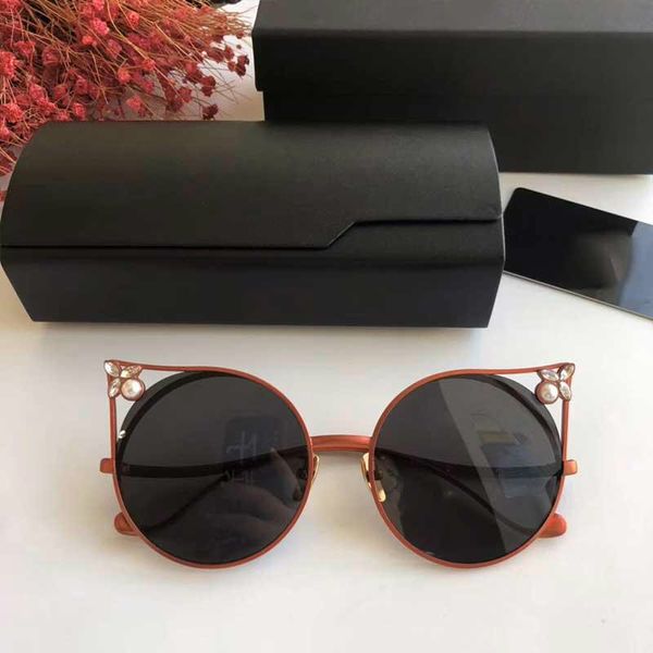 

2020 new fashion design sunglasses cat ear frame unique metal charm pearl embellishment uv 400 protective glasses nine, White;black