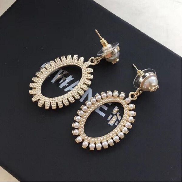 

professional star earrings, round trendy earrings, street sbrass charm earrings, ladies must, White