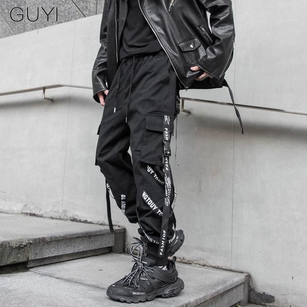 

guyi letter streetwear men fashion pants ribbons harem pockets hip hop male casual sweatpants joggers black cargo pants trousers
