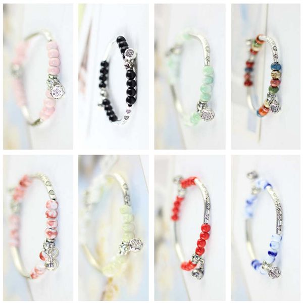 

dhl epacket small fresh tibetan silver ceramic bead bracelet lotus seed jingdezhen jewelry wild female brace djfb109 charm bracelets jewelry, Golden;silver