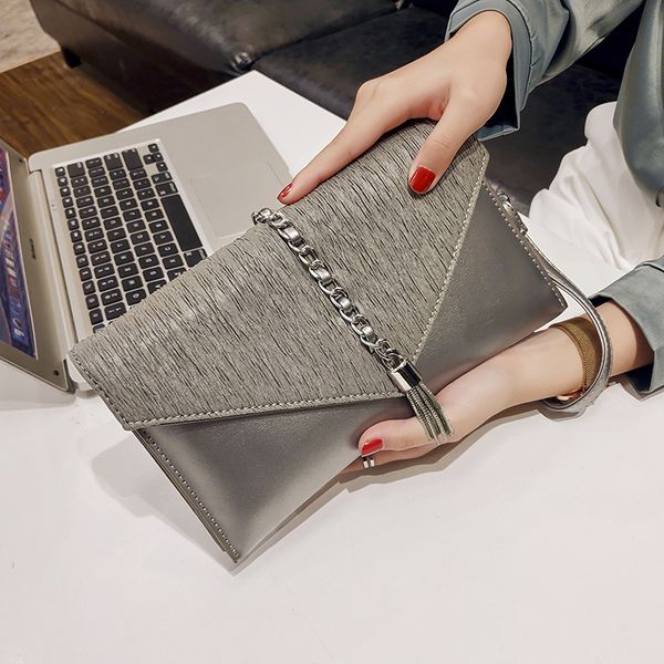 

new women bag fashion pu shoulder bag tassel clutch crossbody