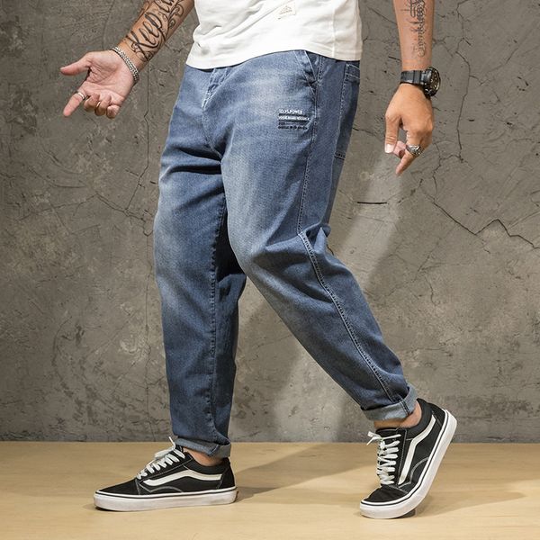 

men jeans 2020 light blue denim stretch jogger pants man fashion side rivets casual haren jean men's trousers plus size 48 7xl