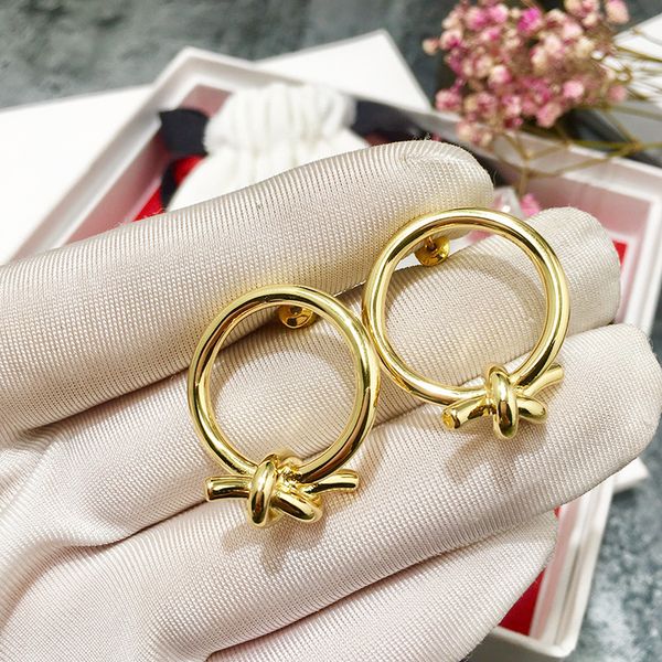 

yellow gold plated big circle knot stud earrings for women new arrival selling luxury fashion jewelry, Golden;silver