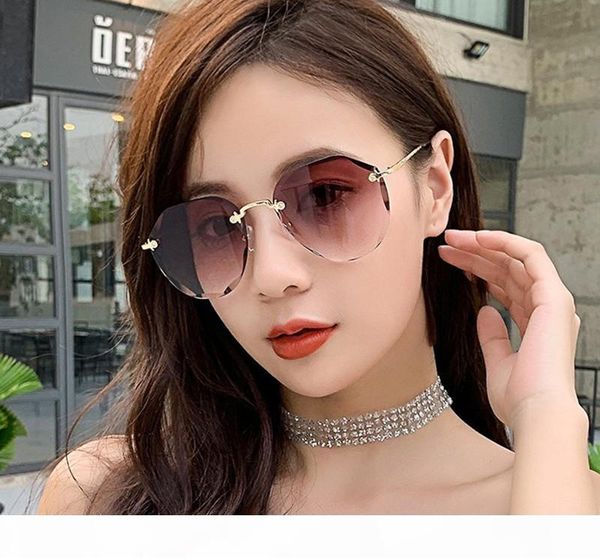 

in stockthe wholesale price european and american trend women sunglasses,high endwomens designer sunglasses,fashion frameless sunglasses, White;black