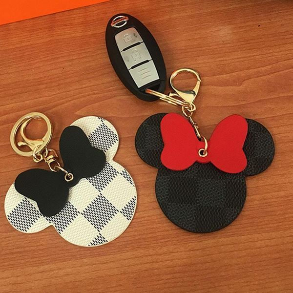 

cgjxscgjxsluxury accessories brand designer cute cartoon leather pendant leather phone ring car keychain women bag handbags pendants