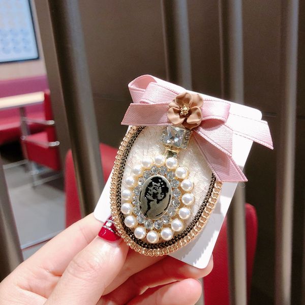 

vintage luxury black white bow perfume bottle pearl flower brooch fashion clothing for woman accessories, Gray