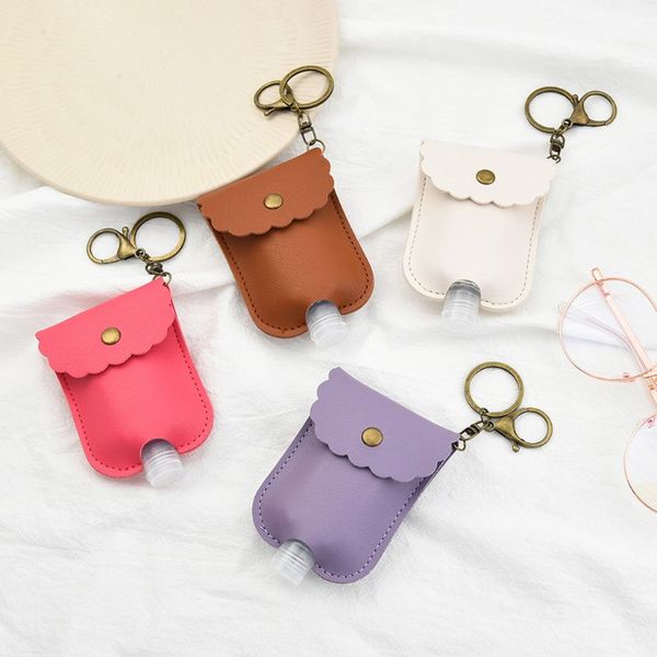 

fashion keychain portable squeeze bottle empty leakproof plastic travel bottle for hand sanitizer with leather keychain, Silver