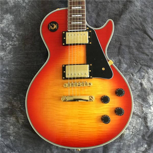 

electric guitar, guitar, gold hardware, clear tiger pattern, in stock