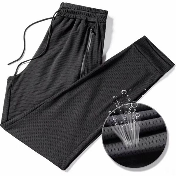 

men's sports hollow summer thin loose air conditioning nine-point ice silk mesh track straight pants, Black