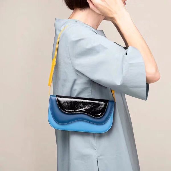 

2020 multi-layer wave pattern flip saddle bag spring summer design shoulder oblique handbag cowhide cross color armpit bag women