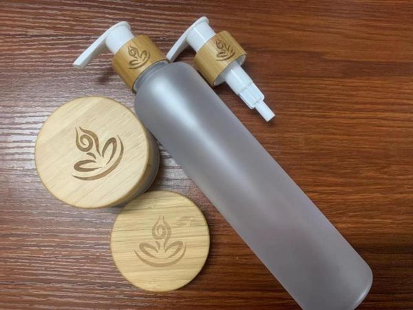 

60ml 120ml 150ml 250ml frosted clear pet plastic cosmetic bottles with bamboo wooden lotion lids 8oz sprayer dispenser bottles