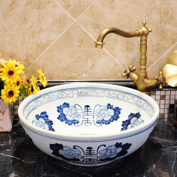 Lavabo rotondo in ceramica Lavobo in stile vintage fatto a mano in Europa, lavabo da bagno blu e bianco da appoggio